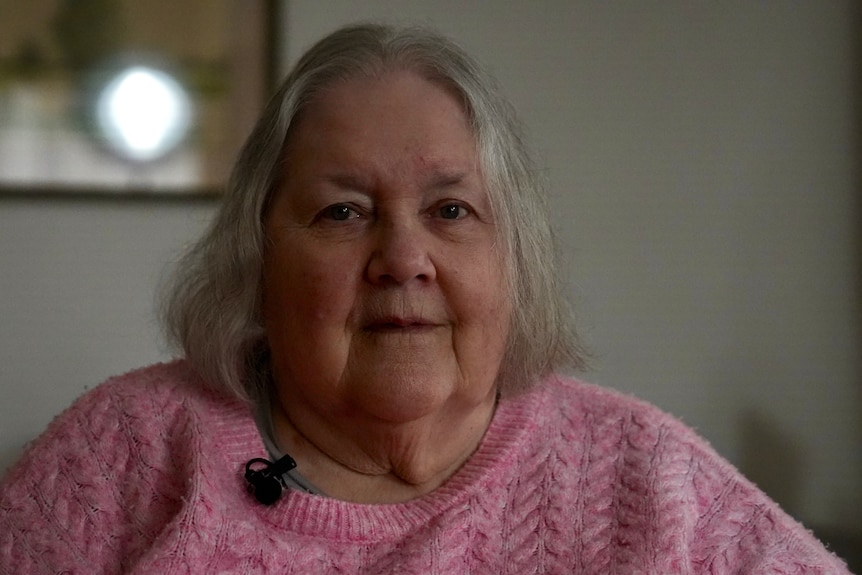 woman looks at the camera